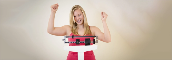 Chiropractic Littleton CO Woman On Scale